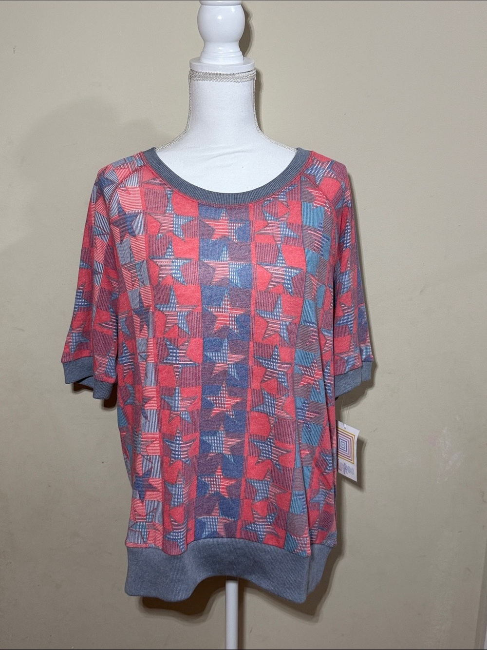 LuLaRoe Jane size L Short Sleeve Knit Top Blue Star Pattern